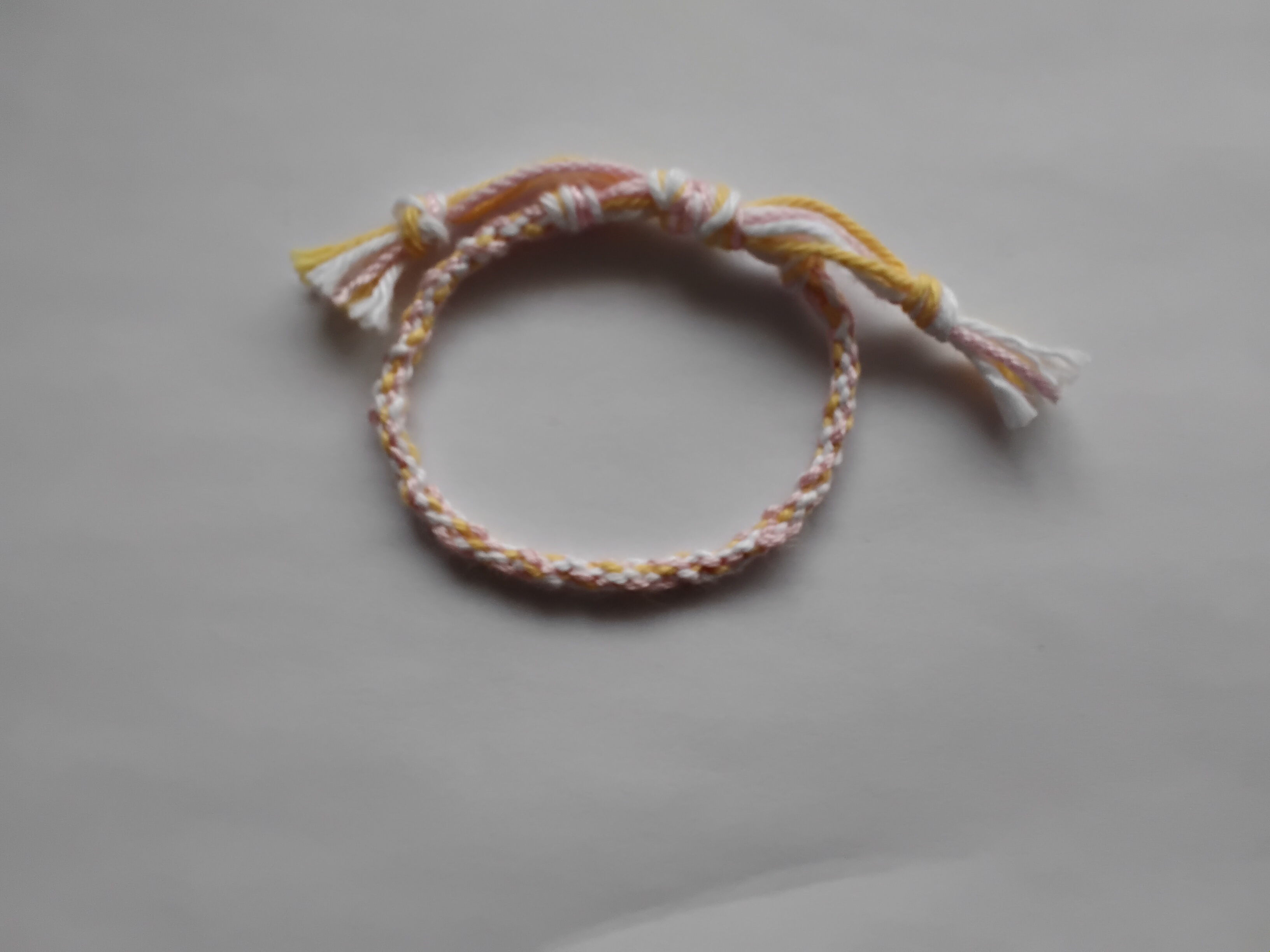 Pulsera rosa con amarillo premium
